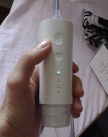 hydropulseur portable - avis clients - oralirrigator.fr