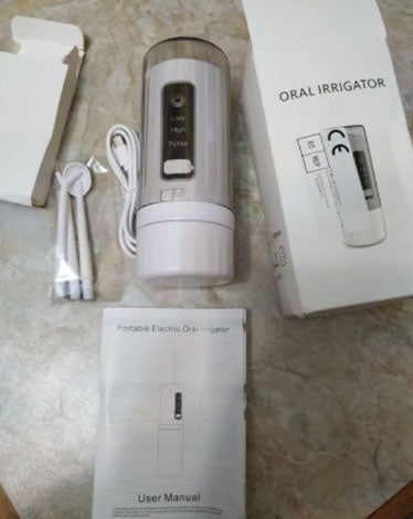 jet dentaire de voyage rechargeable - avis clients - oralirrigator.fr