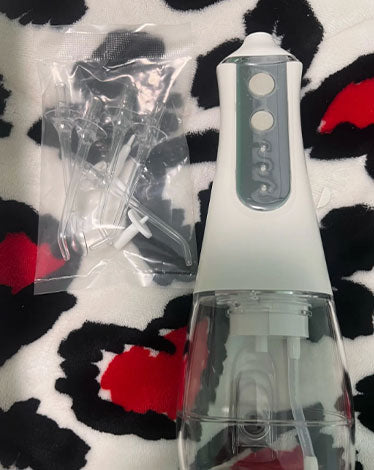 jet dentaire portatif - avis clients - oralirrigator.fr